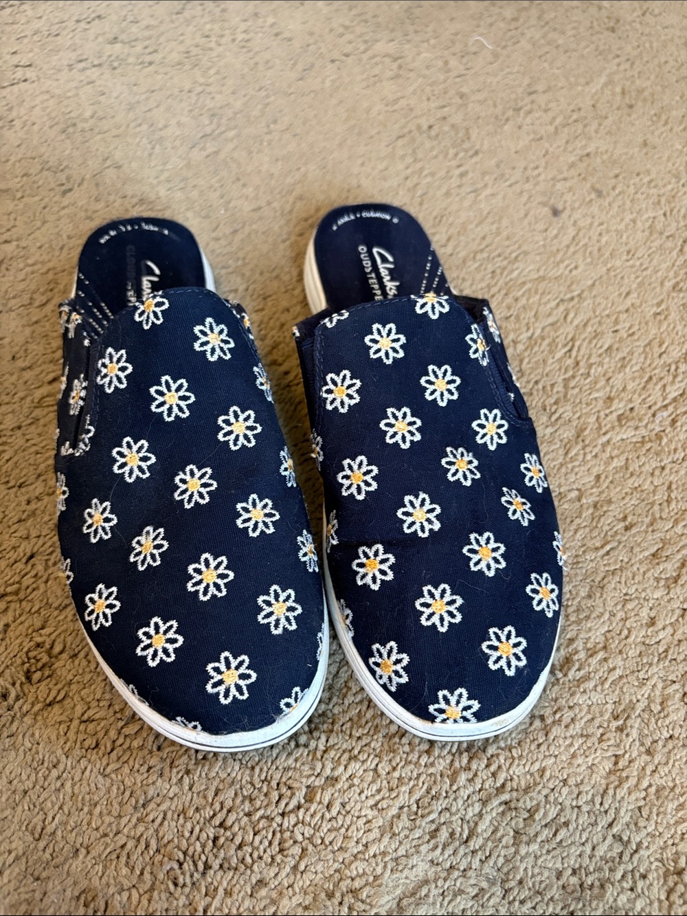 Clarks Navy Slip-On Sneakers with White and Yellow Daisy Embroidery